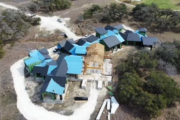 Top view of houses under new construction getting quality roofs installed in South Texas